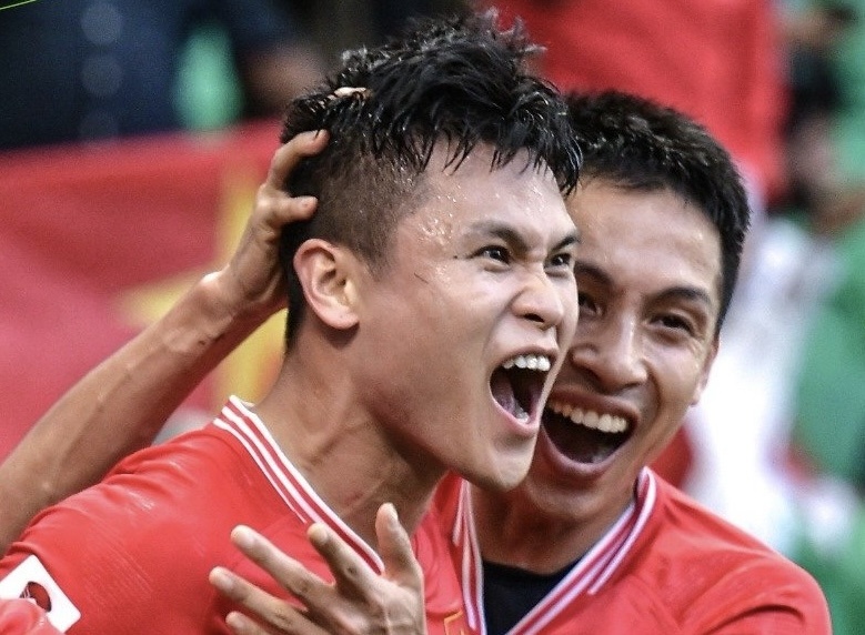 Hung Dung: Chung toi da ky vong chi thua Nhat 2-3 hinh anh