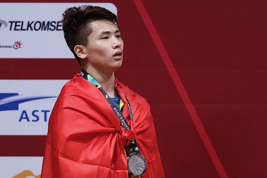 Trinh Van Vinh gianh suat du Olympic Paris 2024 hinh anh