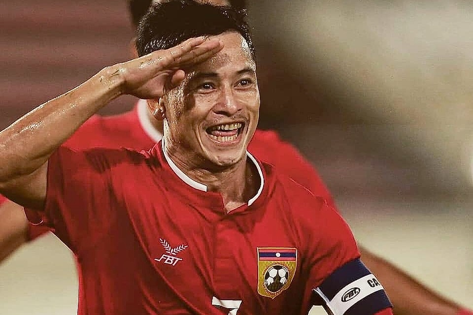 Cuu thu quan tuyen Lao: 'Viet Nam se vo dich' hinh anh