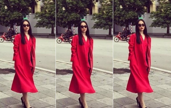 Linh Nga rực rỡ xuống phố với áo choàng đỏ dài kết hợp giày cao gót và kính mắt. Cách chọn đồ của Linh Nga không riêm rúa nhưng lại cực sang.