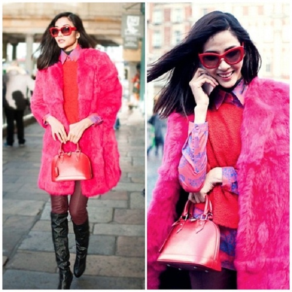 Cũng áo khoác dáng dài nhưng Hoàng Thùy lại không chọn chất liệu dạ hay ca ki mà làm đẹp cho vóc dáng bằng chất liệu lông. Dáng người gầy của siêu mẫu khi mặc áo lông lên tạo cái nhìn đầy đặn và gam màu cũng trông đáng yêu.