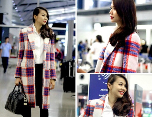 My nhan Viet lang xe mot ao choang dai ngay dong lanh hinh anh