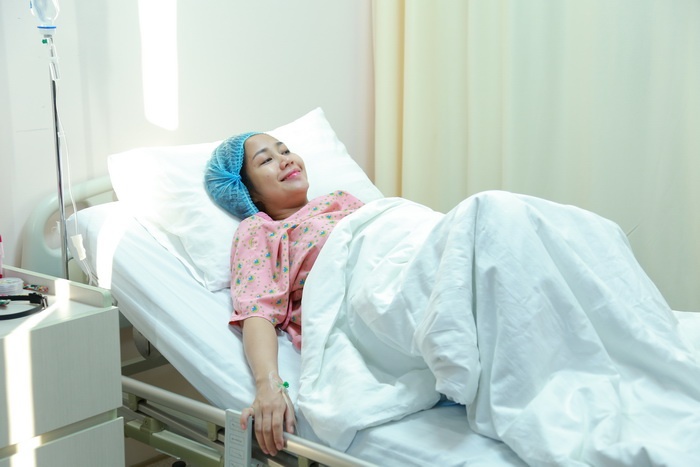 Oc Thanh Van sinh con thu ba hinh anh