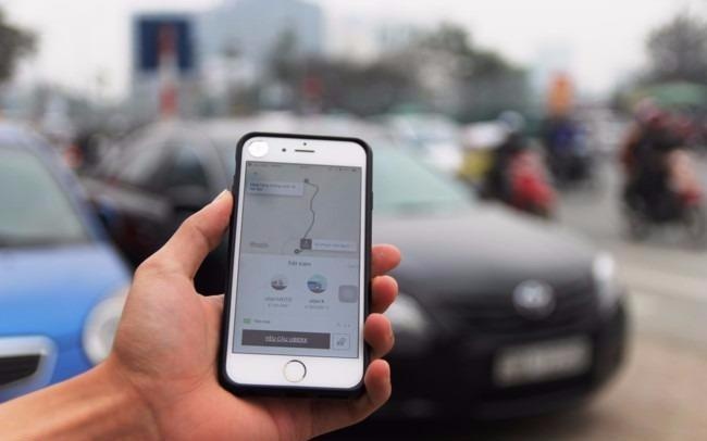 Ha Noi cam dich vu di chung xe cua Uber, Grab hinh anh