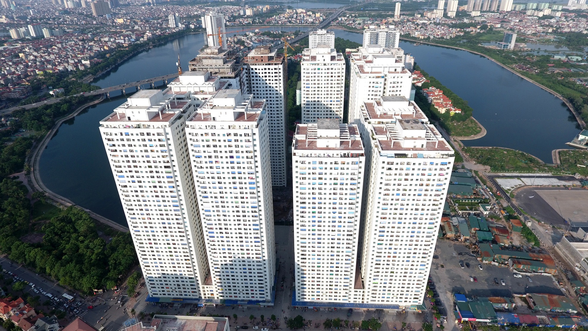 Thay doi mat do, xay dung trai phep phai bo sung nghia vu tai chinh hinh anh