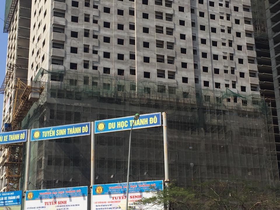 Cu dan mua nha xa hoi to cong ty banh keo cham giao nha hinh anh