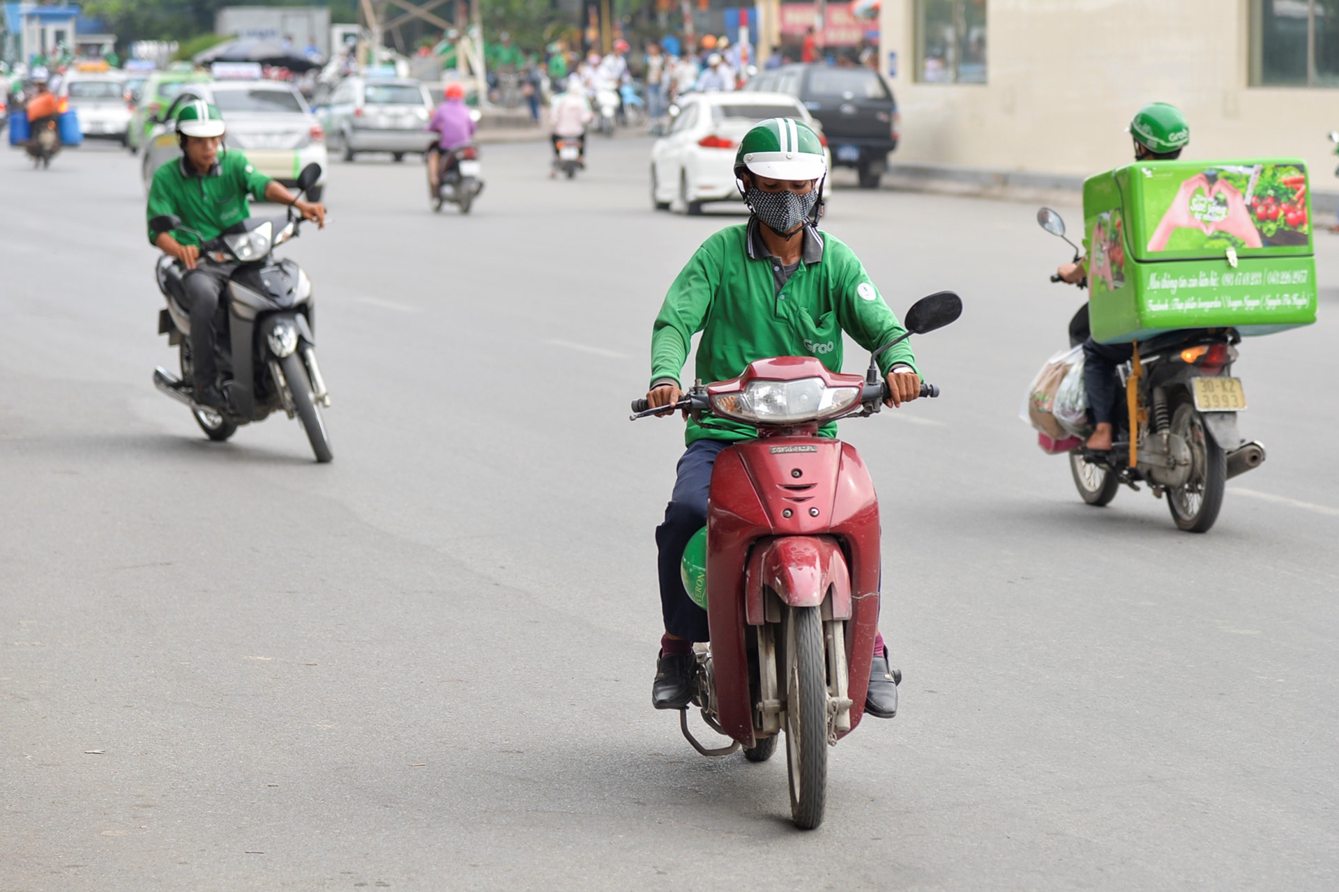 Grab noi se dong 500 ty dong tien thue tai Viet Nam nam 2018 hinh anh