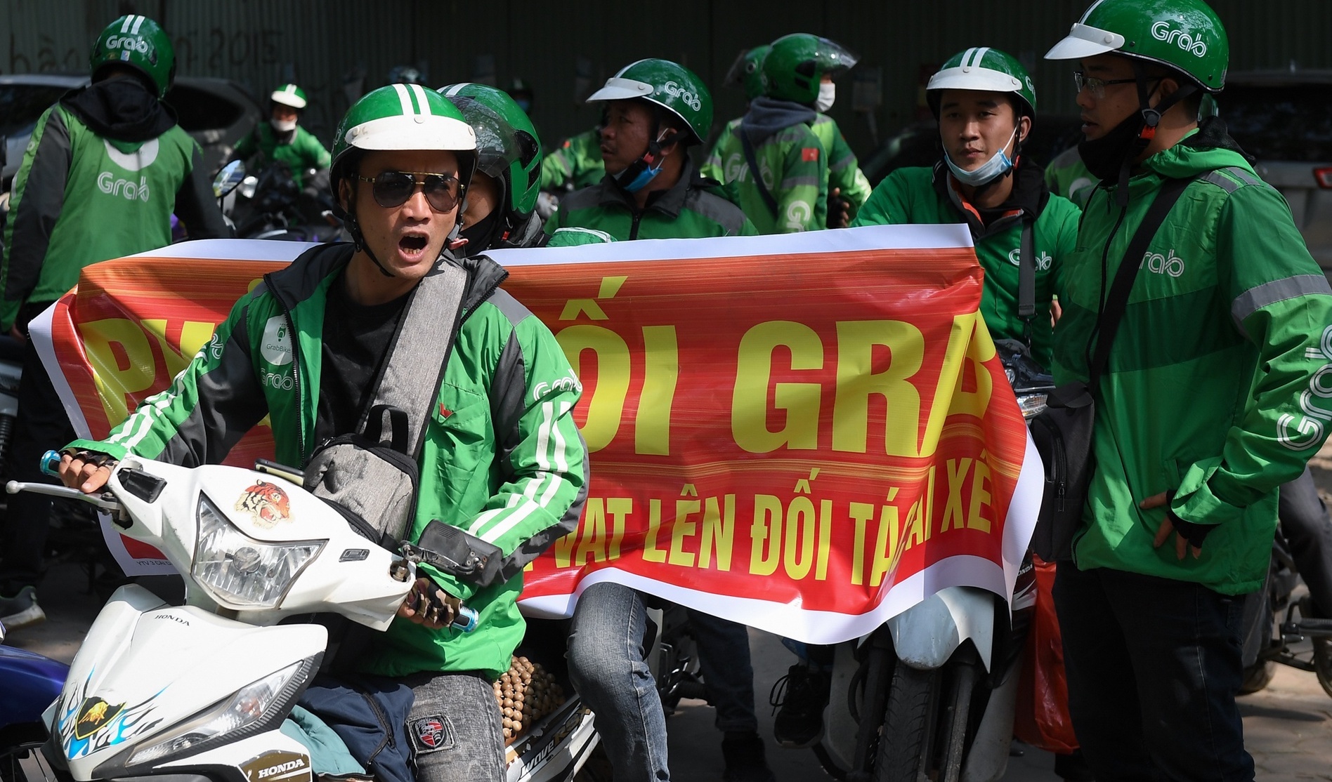 Grab lam gi khi khach hang va tai xe gap kho khan? hinh anh