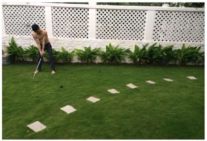 Cong Vinh tap danh golf trong biet thu trieu do hinh anh