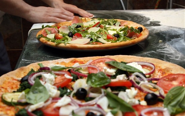 Bánh Pizza, đặc sản nổi tiếng toàn thế giới của Italy. Ảnh: Telegraph.co.uk.
