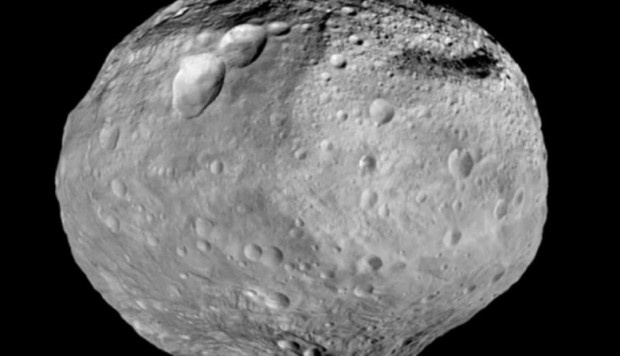 Quy dao tieu hanh tinh dang tien sat Trai Dat hinh anh