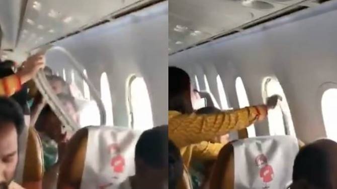 Hanh khach keu khoc khi cua so may bay rung roi tren khong hinh anh