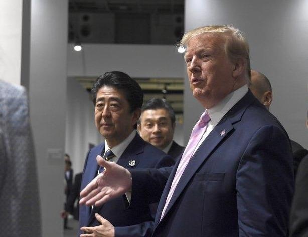 TT Trump bat ngo moi ong Kim Jong Un gap tai khu DMZ vao cuoi tuan hinh anh