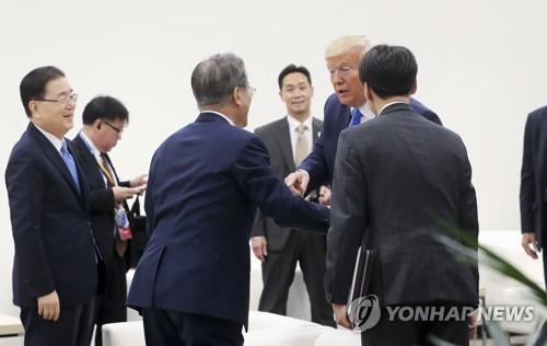 Trump gap Kim Jong Un anh 1