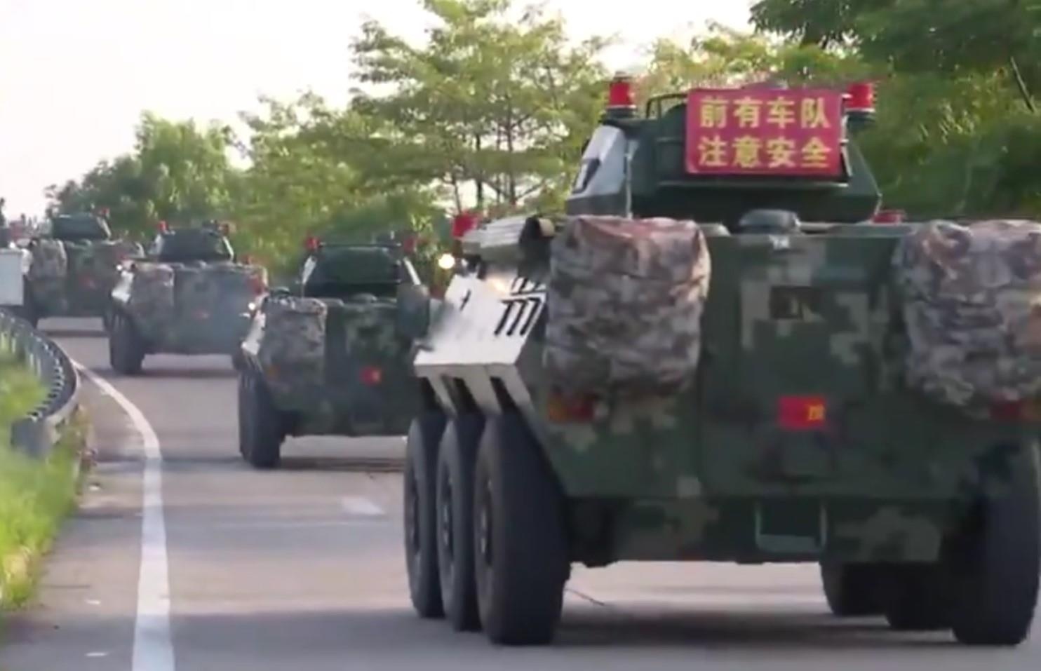 Trung Quoc trien khai xe thiet giap den Tham Quyen hinh anh