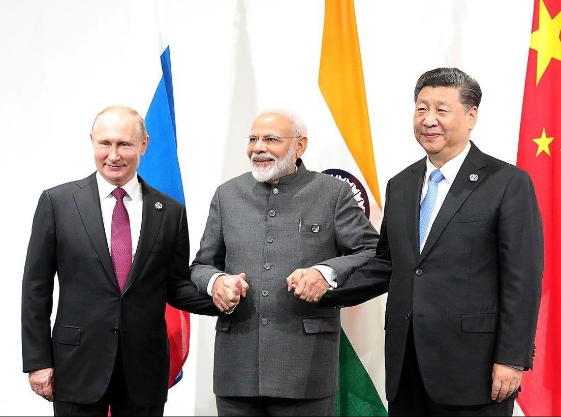 Nga, TQ ngay cang nong am giua su lo ngai cua cac nuoc lang gieng hinh anh