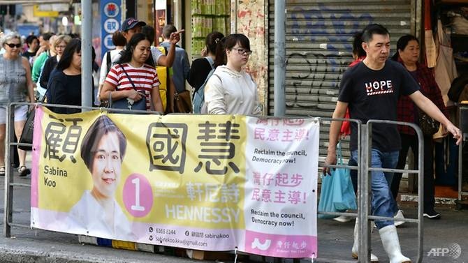 Hong Kong to chuc bau cu giua bat on chinh tri hinh anh