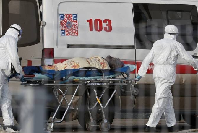 Nga co them hon 10.600 ca nhiem moi, ky luc trong 24 gio hinh anh