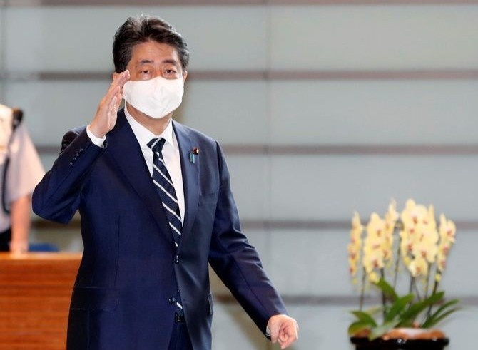 Sau khi tu chuc, ong Abe den tham den Yasukuni hinh anh