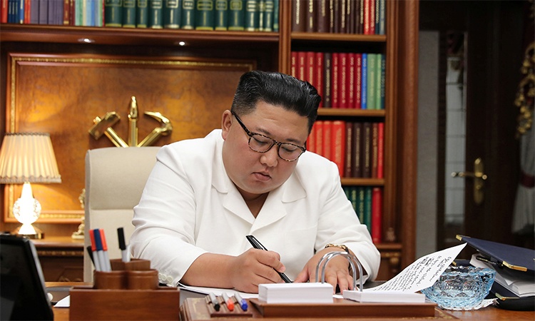 Ong Kim gui loi chuc, mong Tong thong Trump som hoi phuc hinh anh