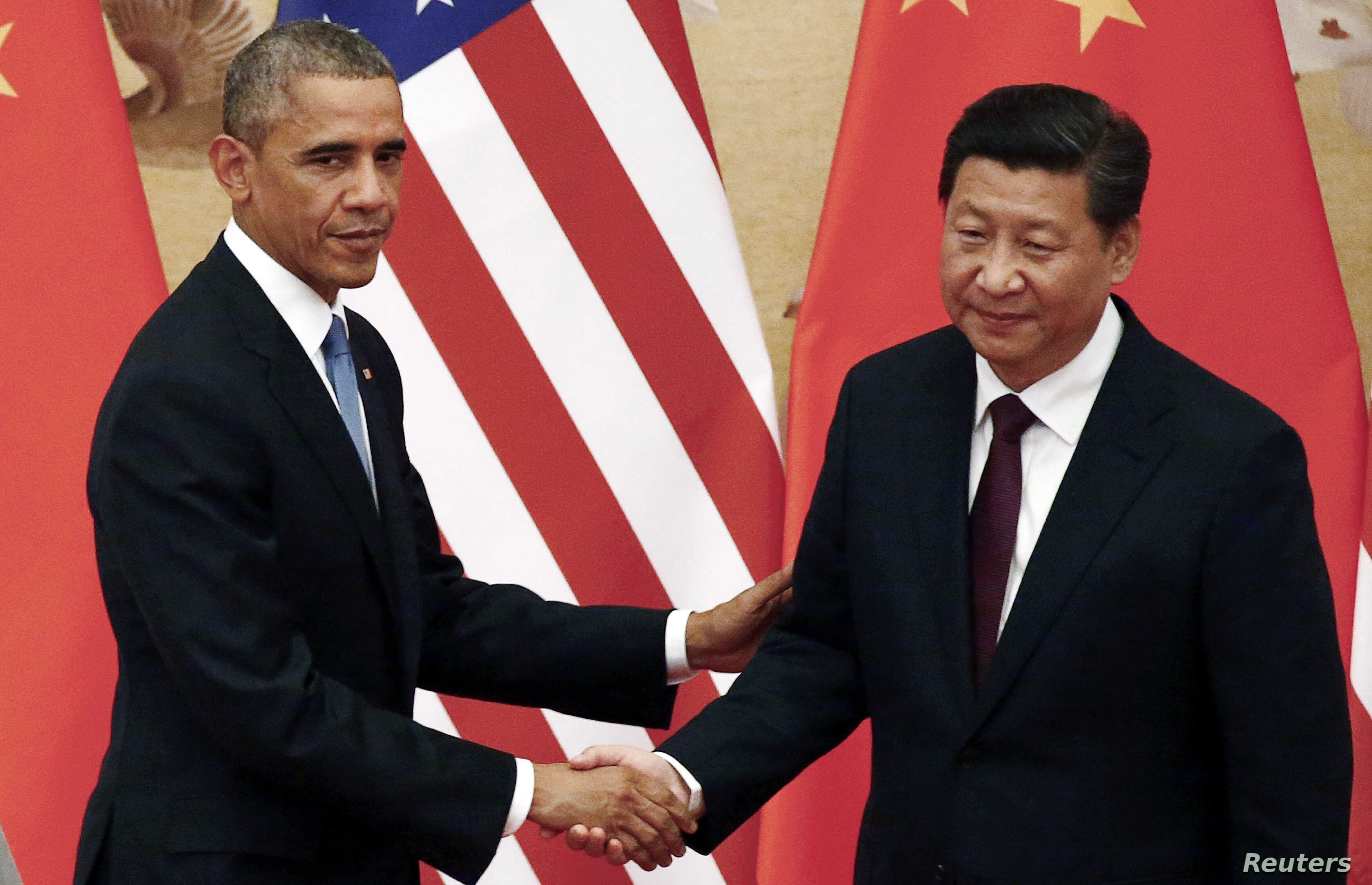 Ong Obama ly giai viec khong cung ran voi Trung Quoc nhu ong Trump hinh anh