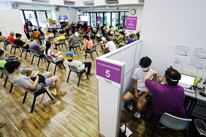 Cot moc buoc ngoat cua Singapore trong viec tiem chung hinh anh