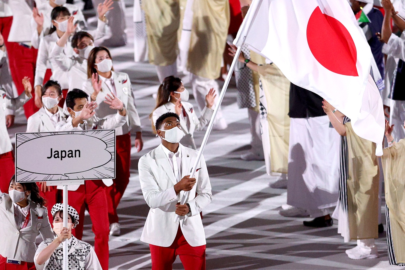olympic van dong vien nhat da mau anh 2