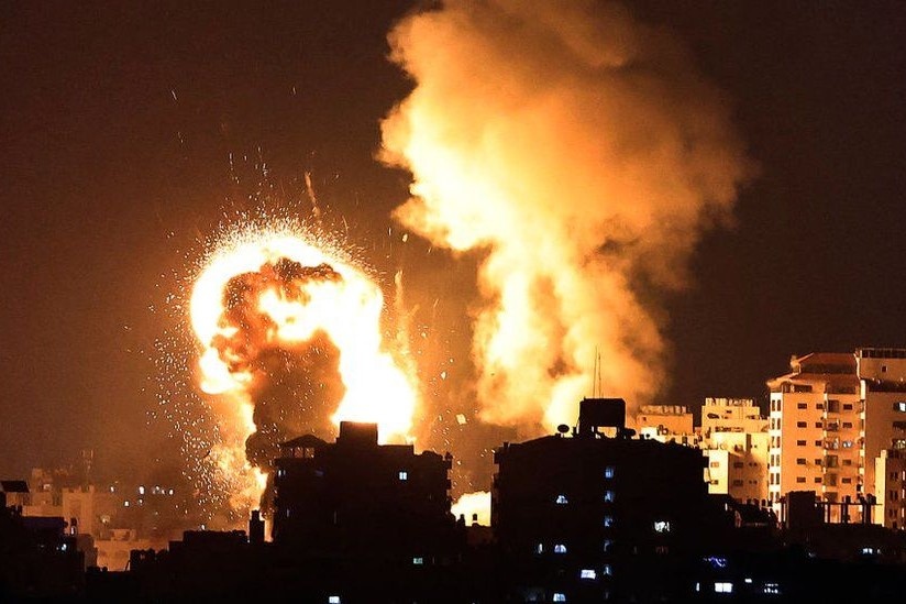 Israel cho cu dan Gaza 15 phut di tan truoc khi khong kich hinh anh