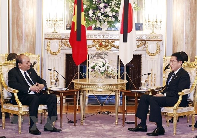 Chu tich nuoc Nguyen Xuan Phuc hoi dam voi thu tuong Nhat Ban hinh anh