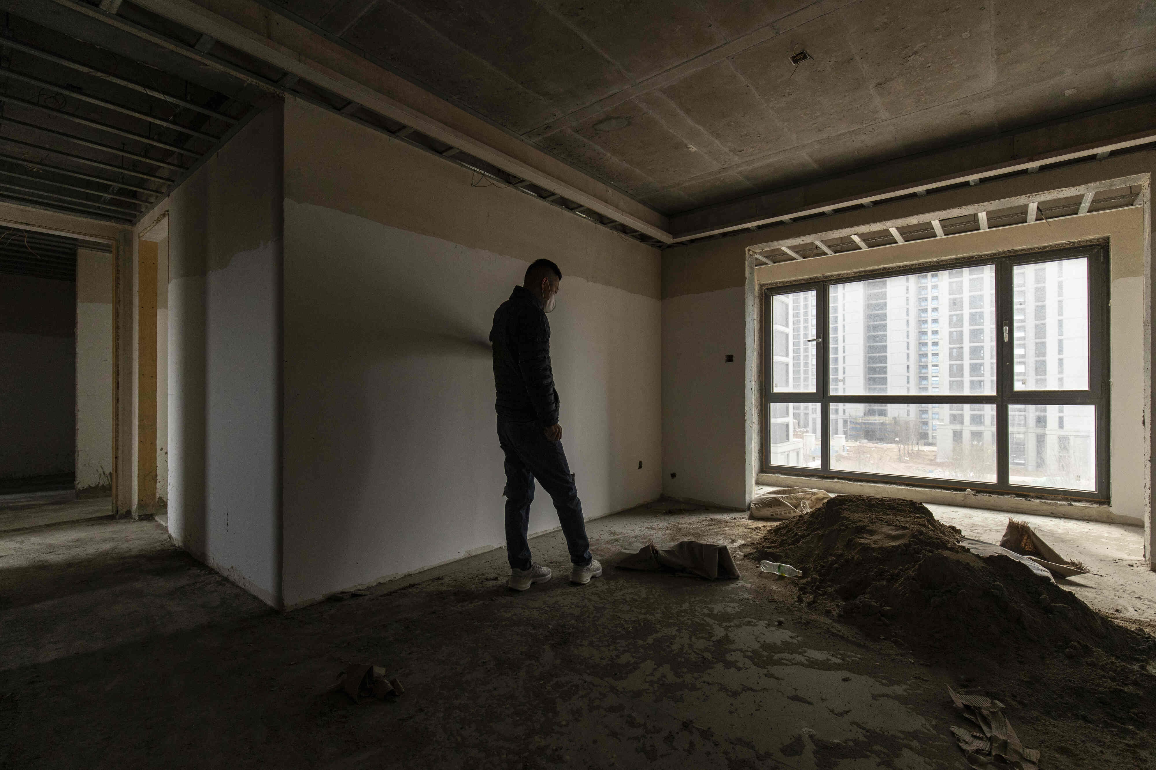 Nhung nguoi Trung Quoc tra tien mua can ho nhung nha khong duoc xay hinh anh