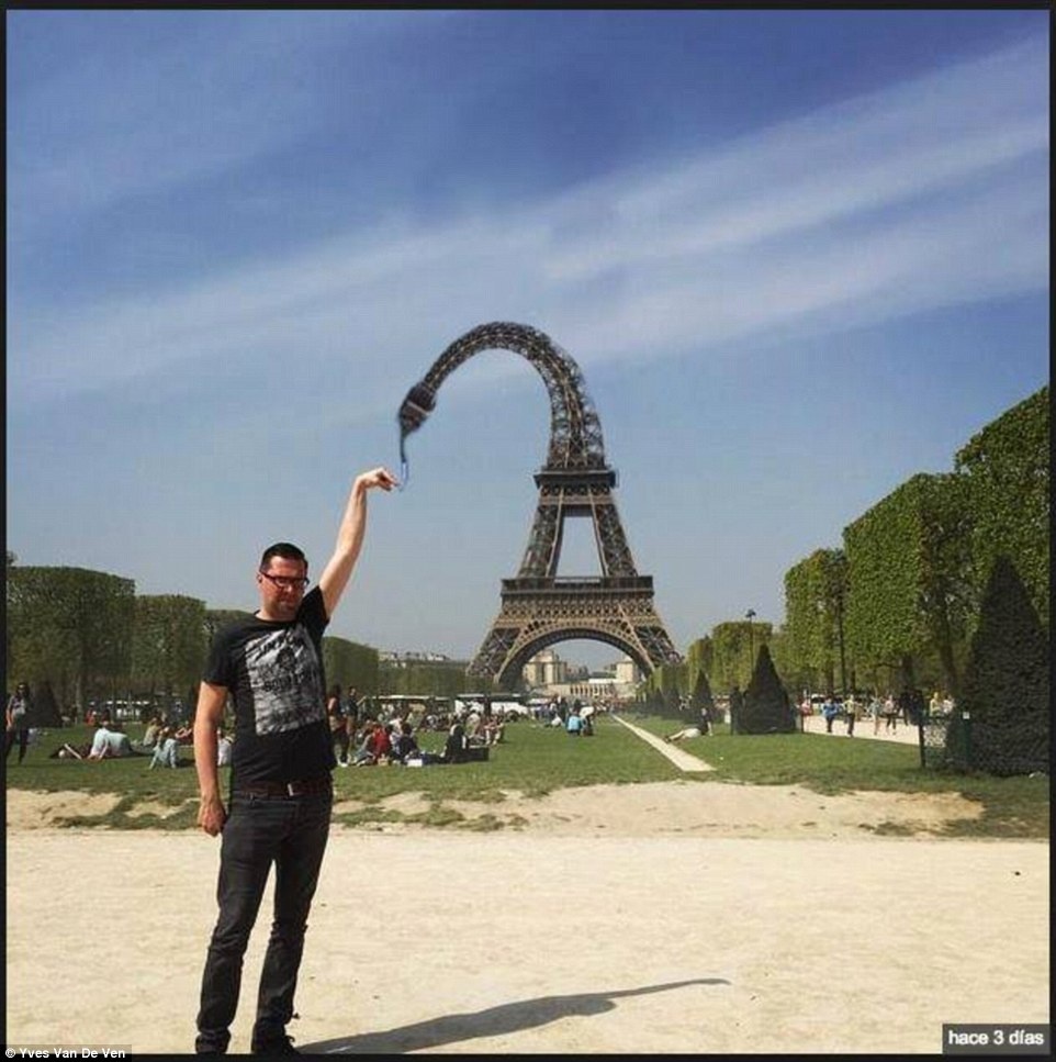 Tháp Eiffel uốn cong mình để chạm tay du khách.