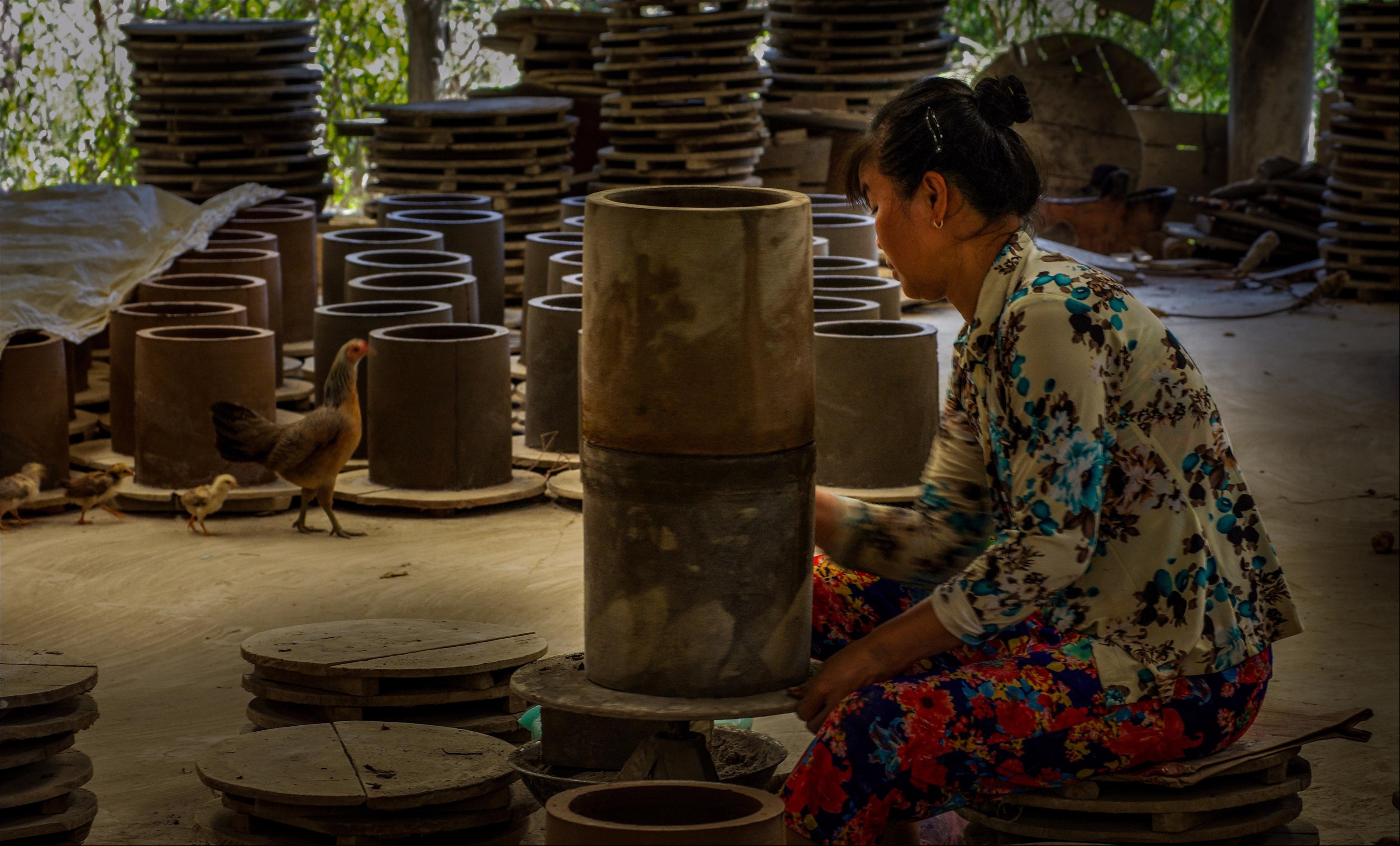 Làng gốm Vĩnh Long trong bộ ảnh Dấu ấn Việt Nam ảnh 6 Lang gom Vinh Long trong bo anh Dau an Viet Nam anh 6
