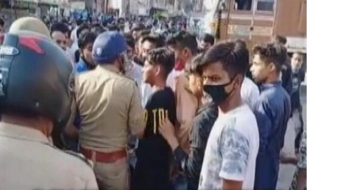 Canh sat danh chet vi vi pham lenh gioi nghiem,  cau be 17 tuoi,  ban rau anh 1