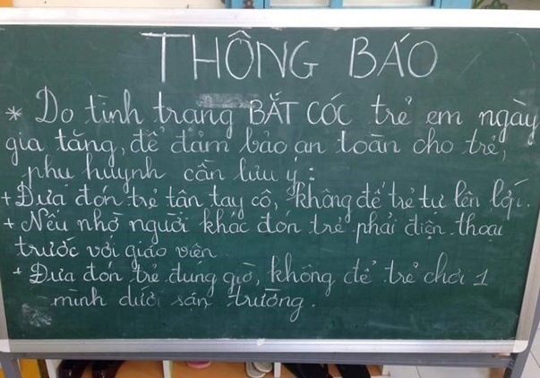 Truong hoc o Sai Gon siet an ninh de phong bat coc tre em hinh anh