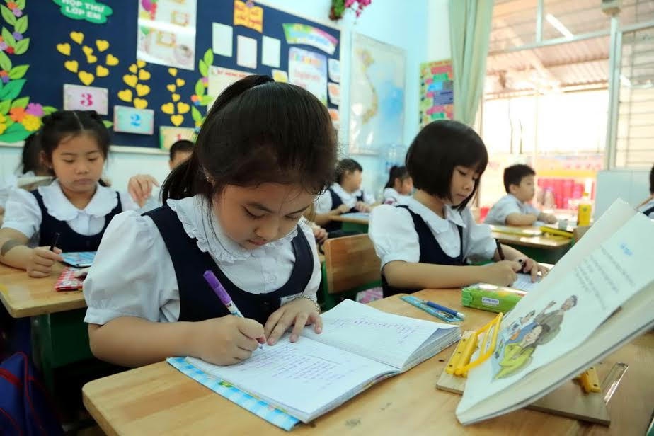 Truong tieu hoc o TP.HCM: Giao vien tu ra de kiem tra hoc ky hinh anh