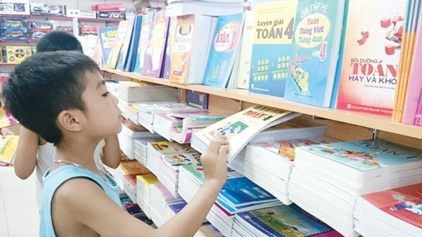 De nghi So GD&DT TP.HCM lam viec voi NXB Giao duc ve tien thu lao SGK hinh anh