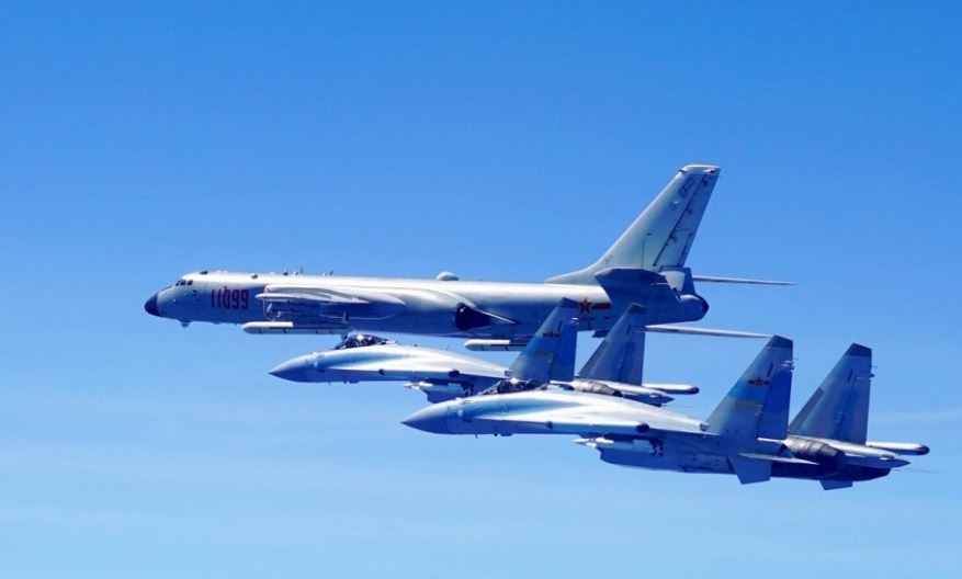 Lau Nam Goc len an vu TQ cat, ha canh may bay nem bom o Hoang Sa hinh anh