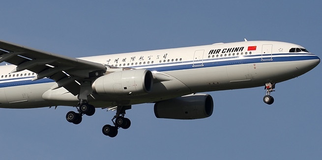 May bay Air China quay dau, ha canh khan vi cabin ngap khoi hinh anh