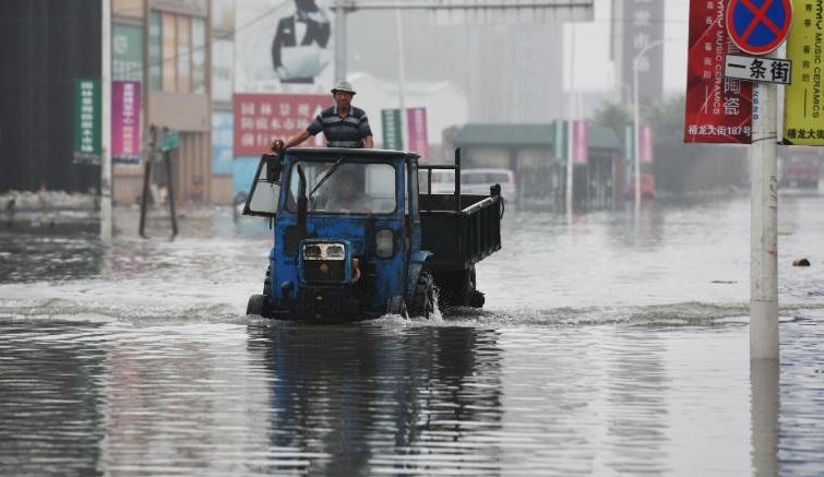 Thien tai khap chau A - tu nang chet nguoi den bao to, lu du hinh anh
