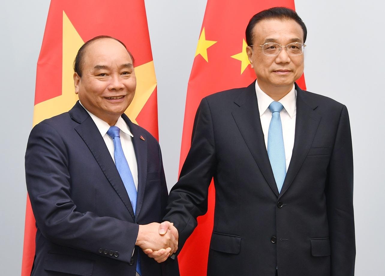 Thu tuong gap lanh dao Trung Quoc, Na Uy ben le ASEM 12 hinh anh