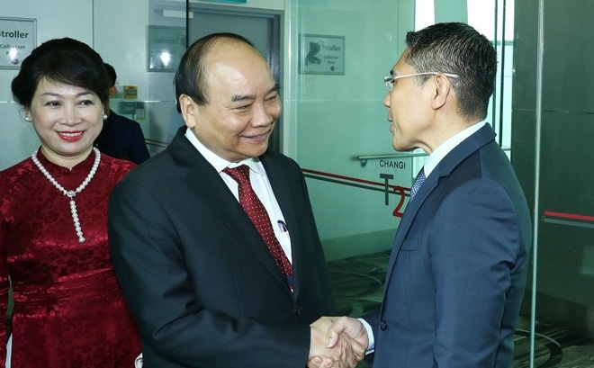 Thu tuong Nguyen Xuan Phuc den Singapore du hoi nghi cap cao ASEAN hinh anh