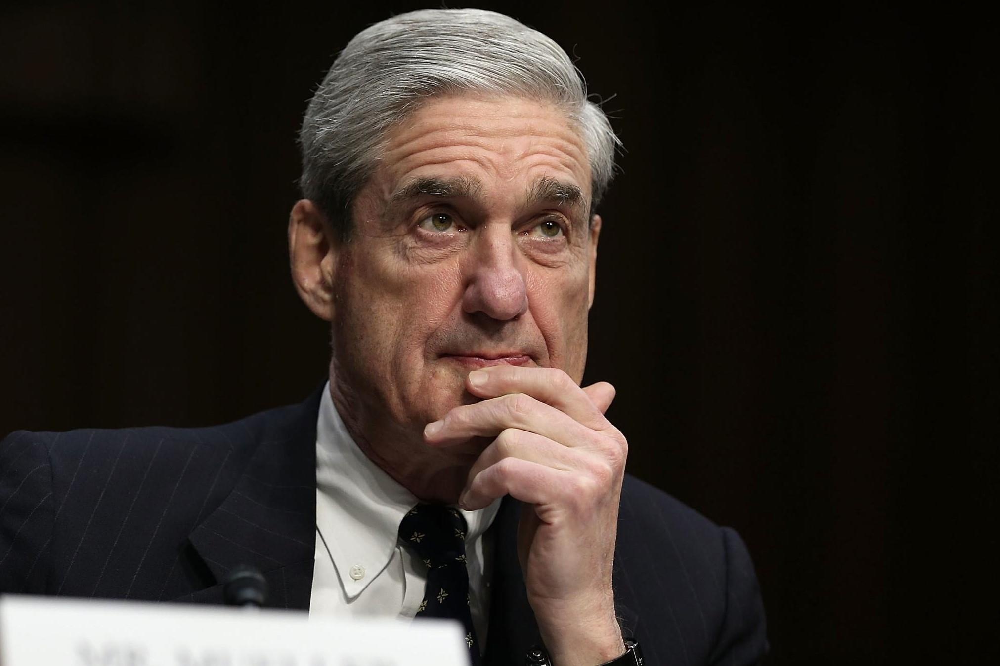 Bao cao Mueller: Ong Trump vua mo loi, tin tac Nga nham toi ba Clinton hinh anh