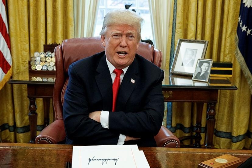 TT Trump thua kien, buoc phai cong khai bao cao tai chinh hinh anh