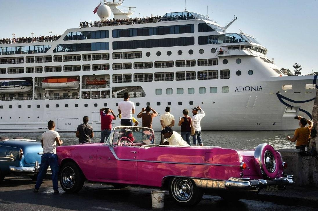 My khoi phuc lenh cam du khach den Cuba, pha bo di san Obama hinh anh