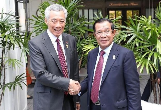 Ong Ly Hien Long va ong Hun Sen dong y khong xat muoi 'vet thuong cu' hinh anh