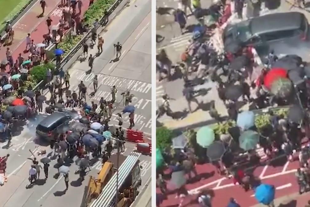 Oto lao thang vao nguoi bieu tinh Hong Kong, hat tung rao chan hinh anh