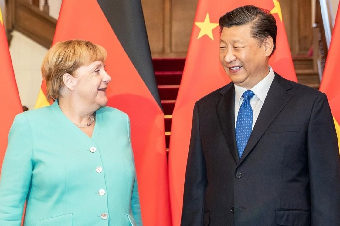 Ong Tap hua voi ba Merkel: Trung Quoc se mo cua nen kinh te hinh anh