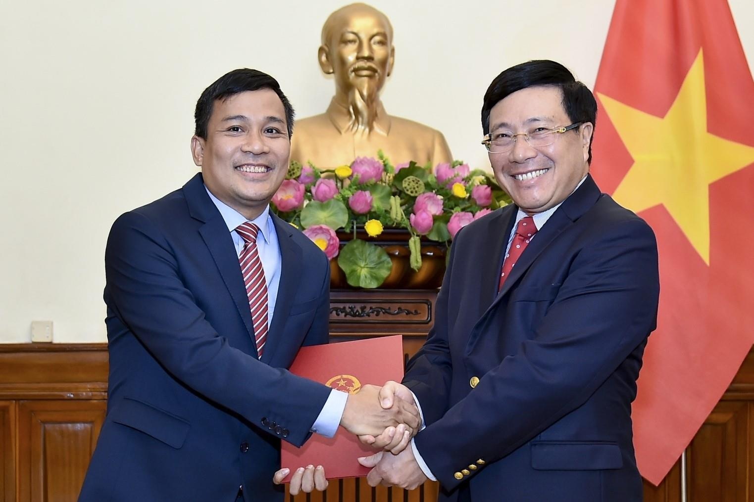 Ong Nguyen Minh Vu duoc bo nhiem lam Thu truong Bo Ngoai giao hinh anh