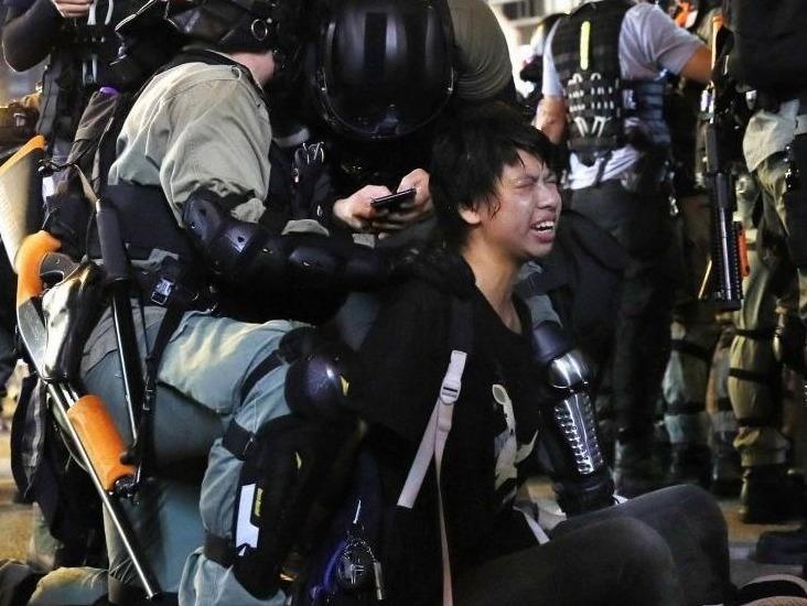 Trung Quoc canh cao Apple vi ung ho nguoi bieu tinh Hong Kong hinh anh