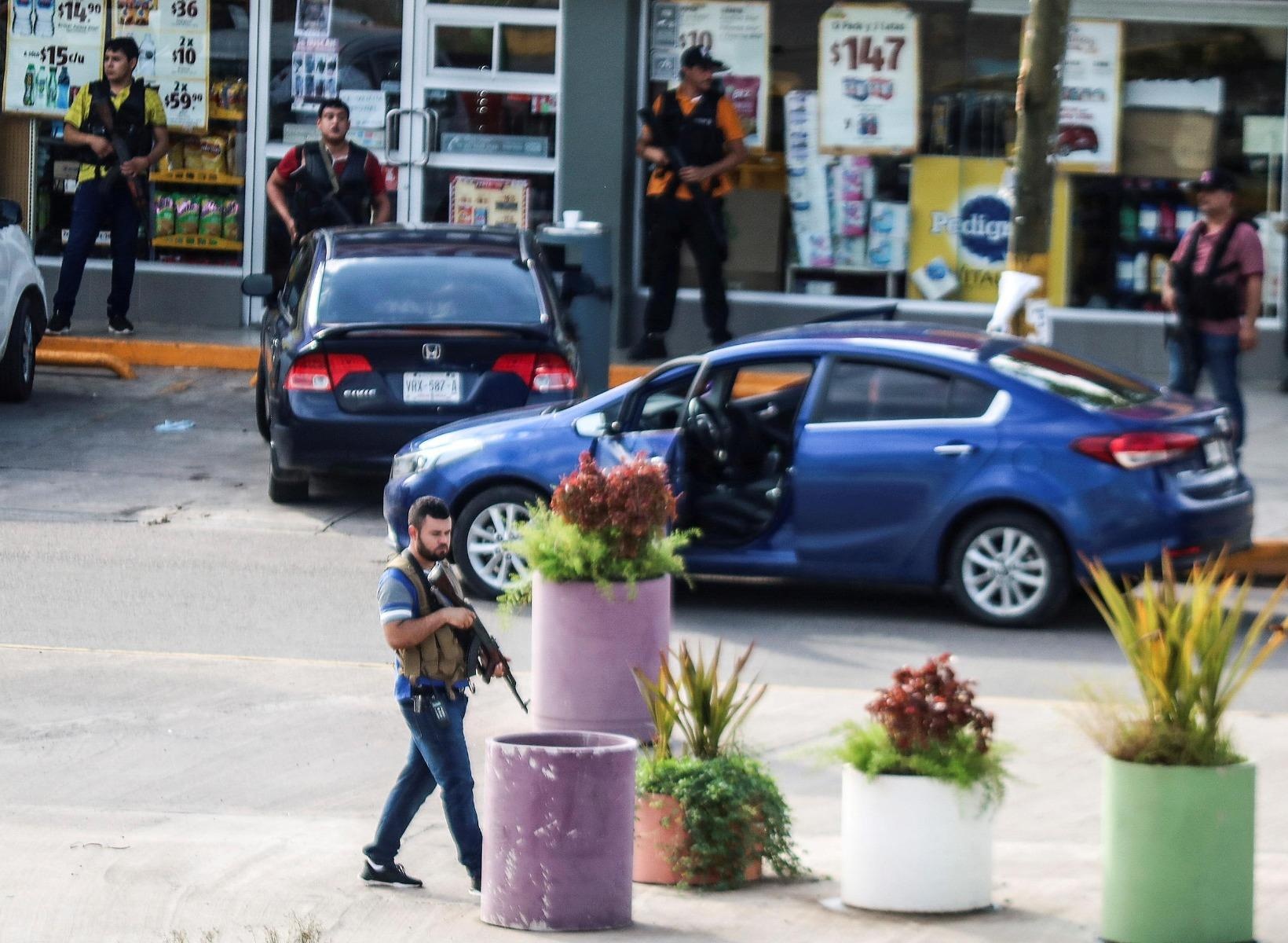 Bang nhom ma tuy danh tra quyet liet, Mexico phai tha con cua El Chapo hinh anh